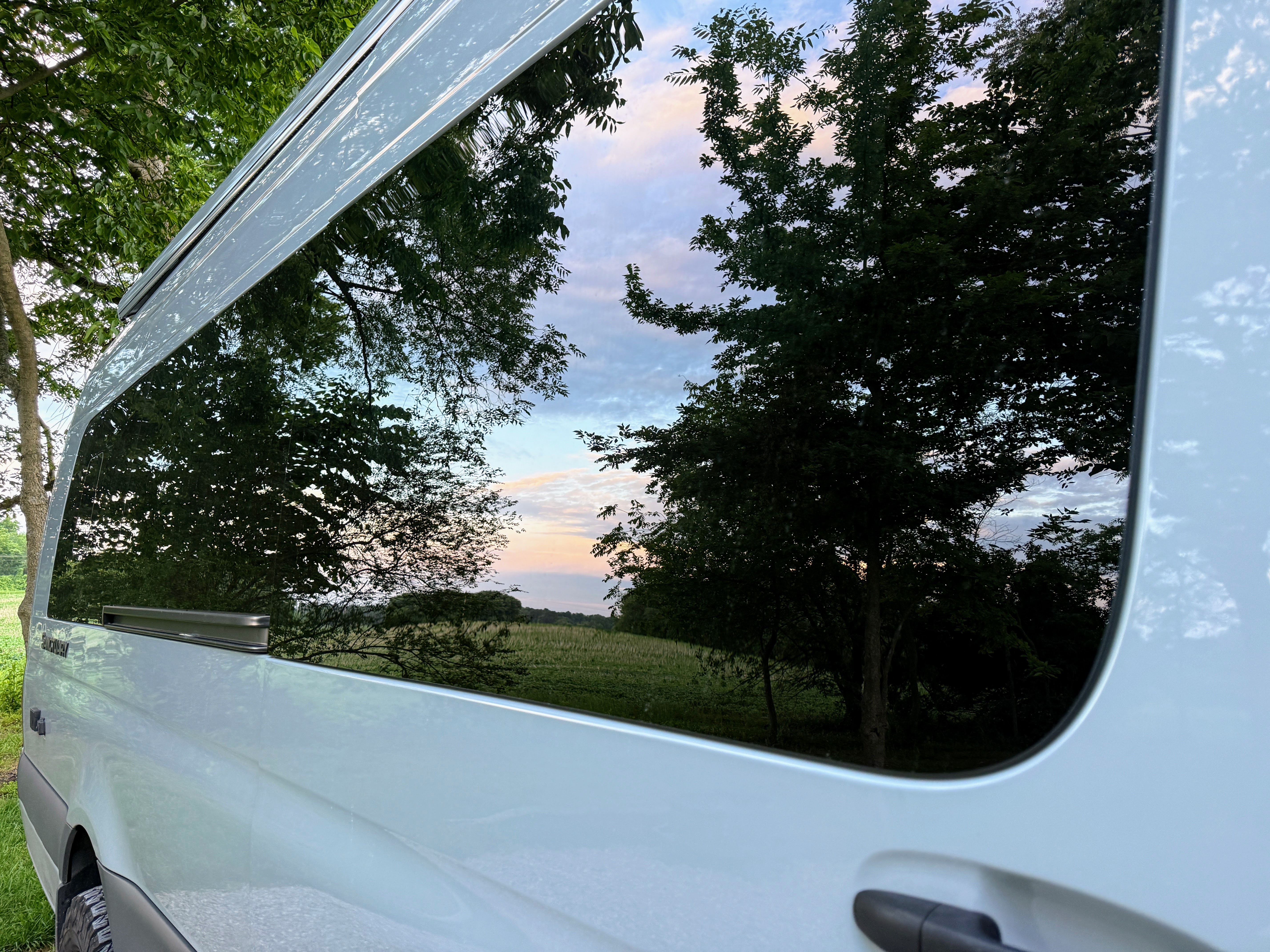 Sunset reflected in the van window at 370 Lakeside Park, MO