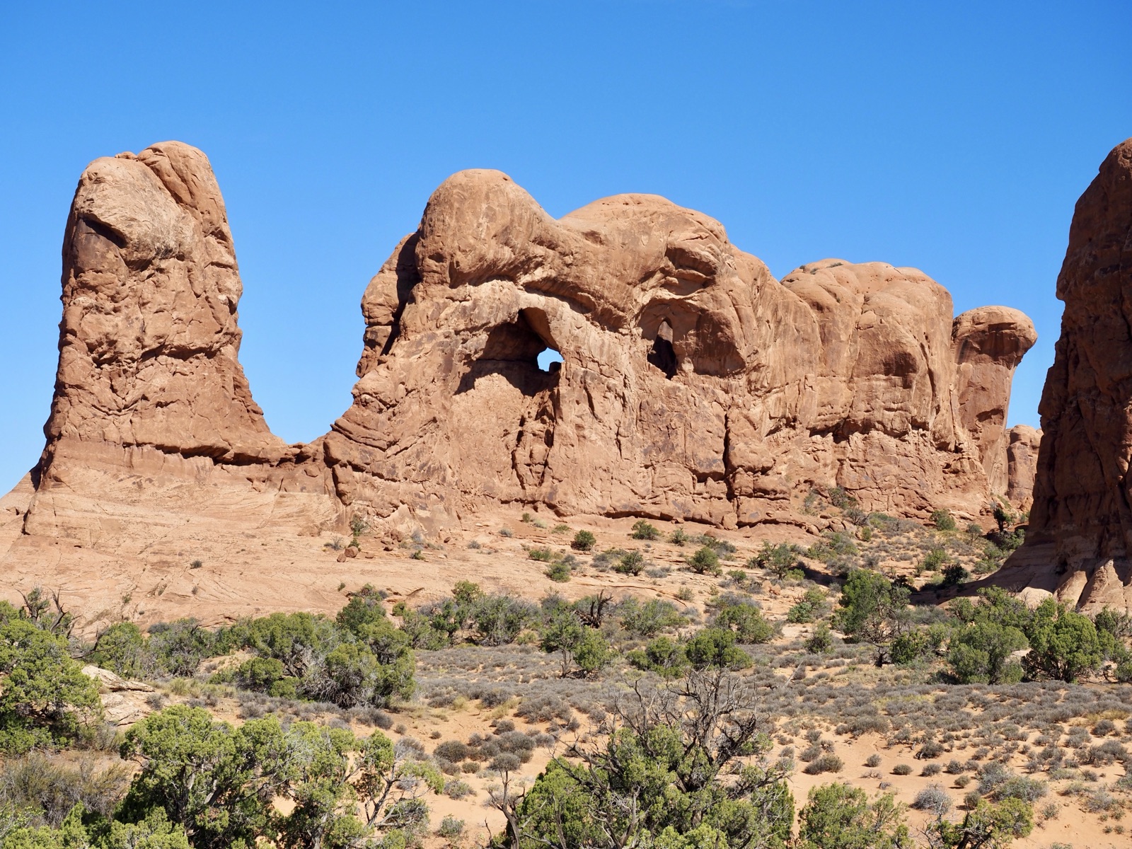 A sandstone arch framing the sky at Arches National Park.