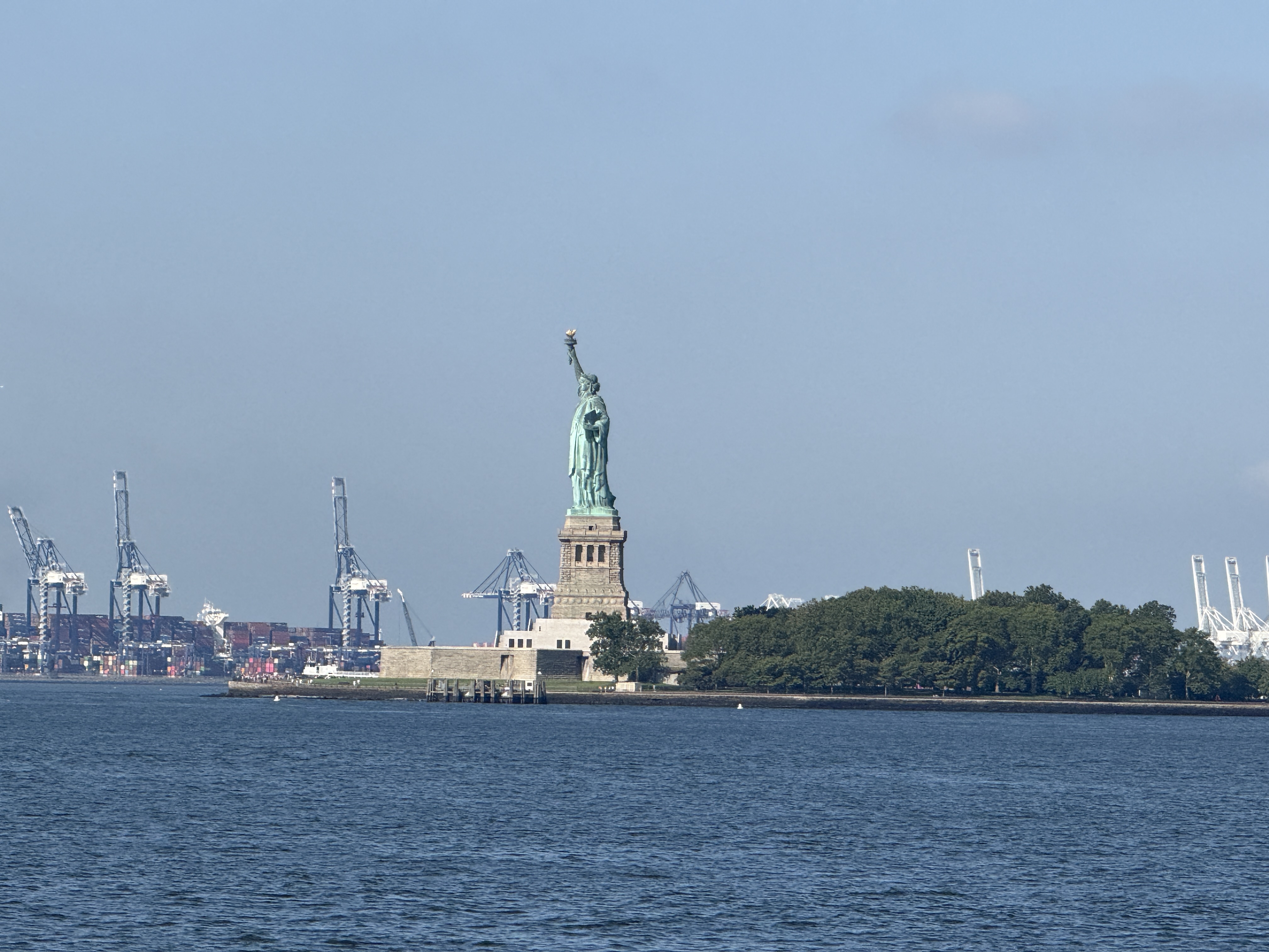 The Statue of Liberty seen from the bow of the approaching ferry