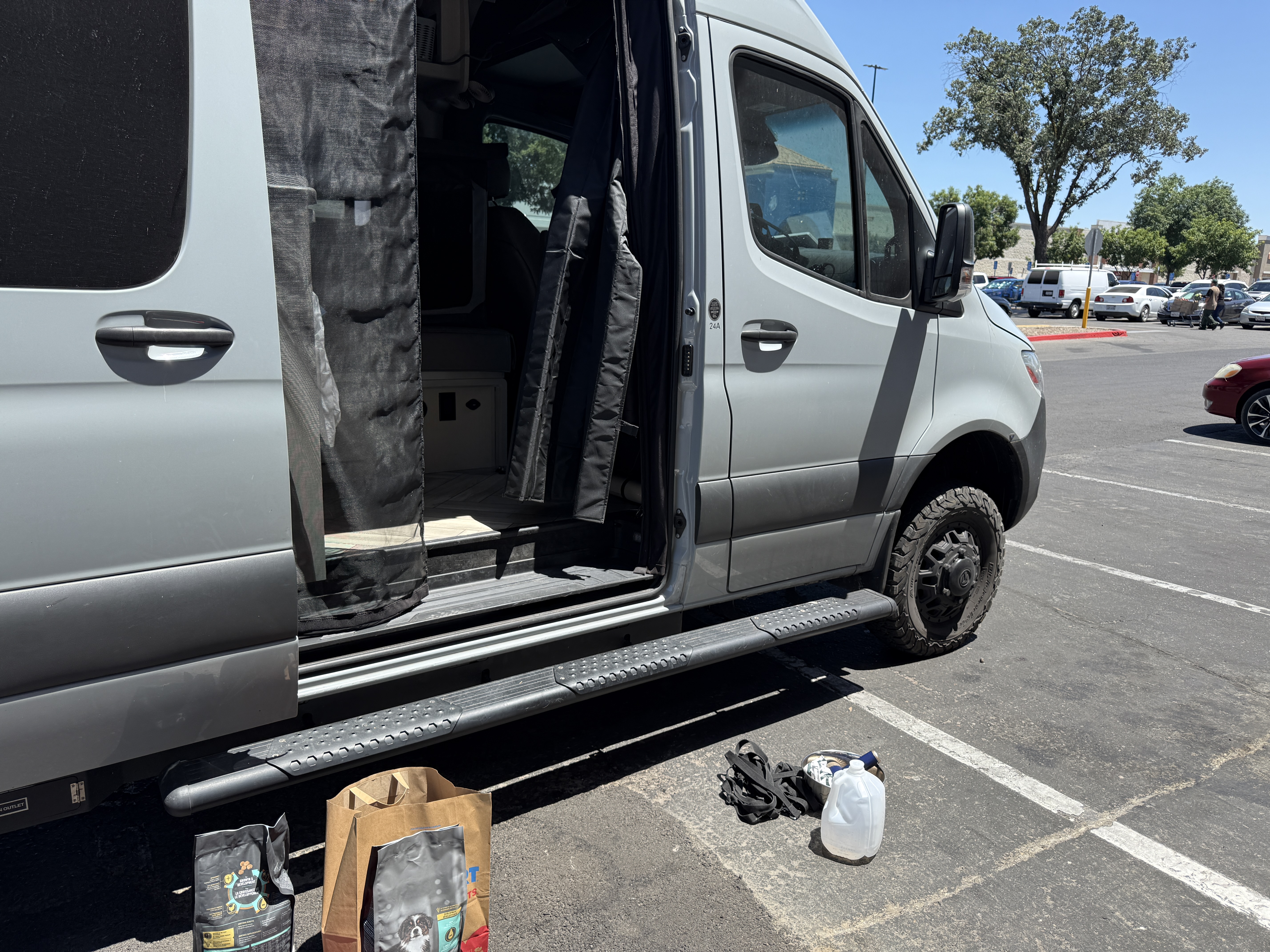 Deep-cleaning the van in a Walmart lot — the glamorous side of road life.